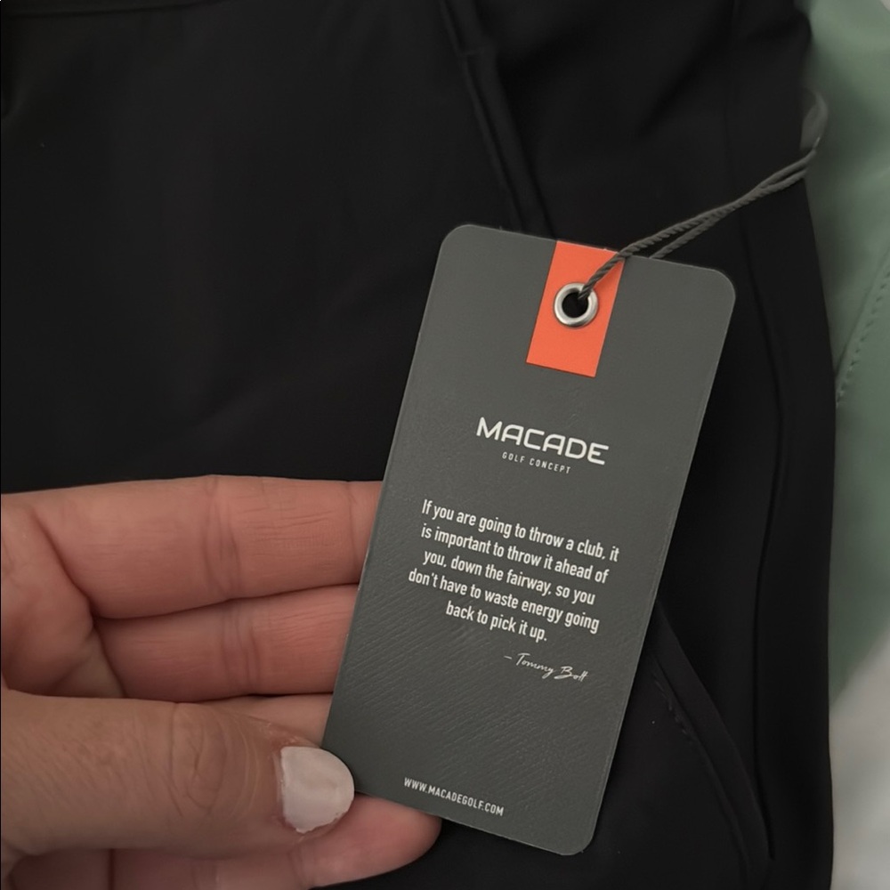 MACADE Golf Concept Black Golf Top With Orange Accent Tag